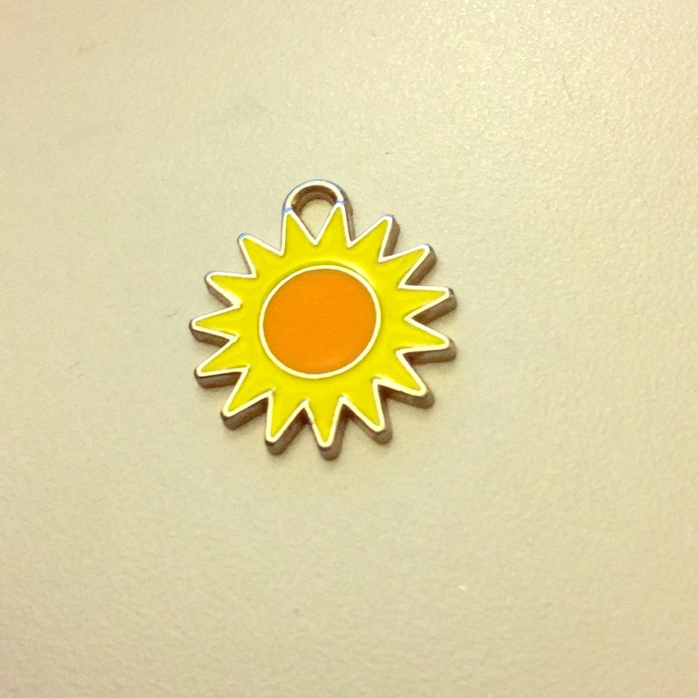 Silver Sun Charm
